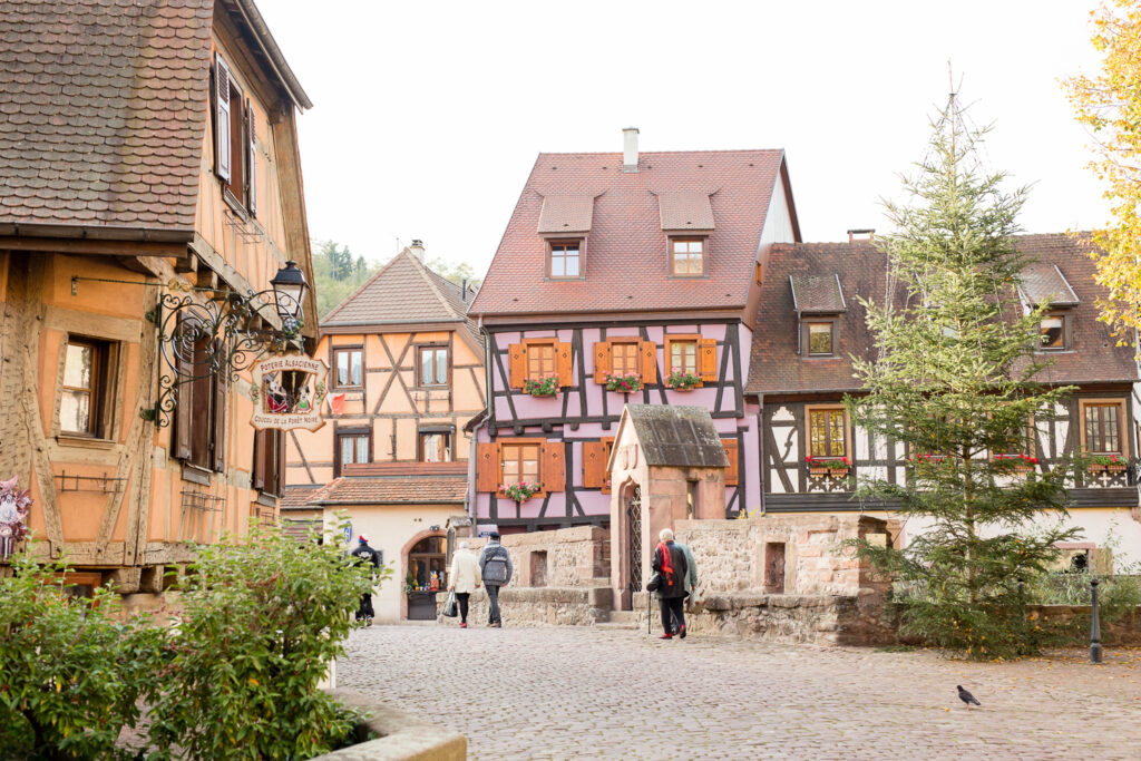 Village square with half-timbered houses in Kaysersberg, Alsace