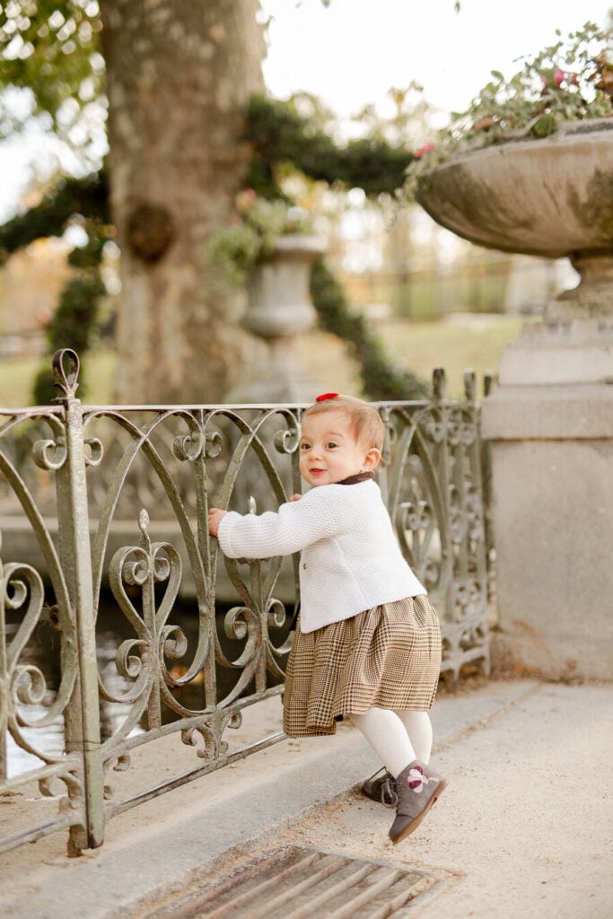 Portrait of young girl at Luxembourg Gardens in Paris: Fall Packing Guide by Katie Donnelly Photography