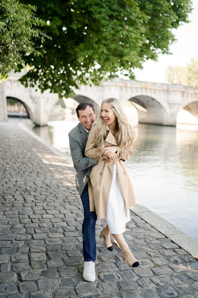 Portrait of couple hugging on the banks of the Seine River in Paris: Heat Wave Survival Guide to stay cool in summer by Katie Donnelly Photography