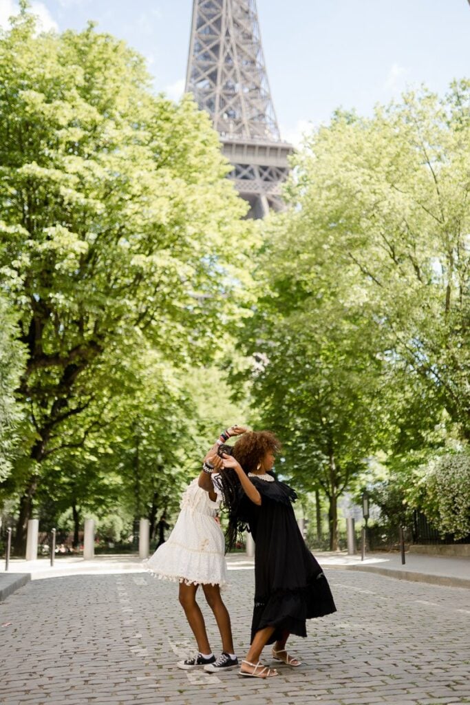 Portrait of mother and daughter near Eiffel Tower in Paris by Katie Donnelly Photography