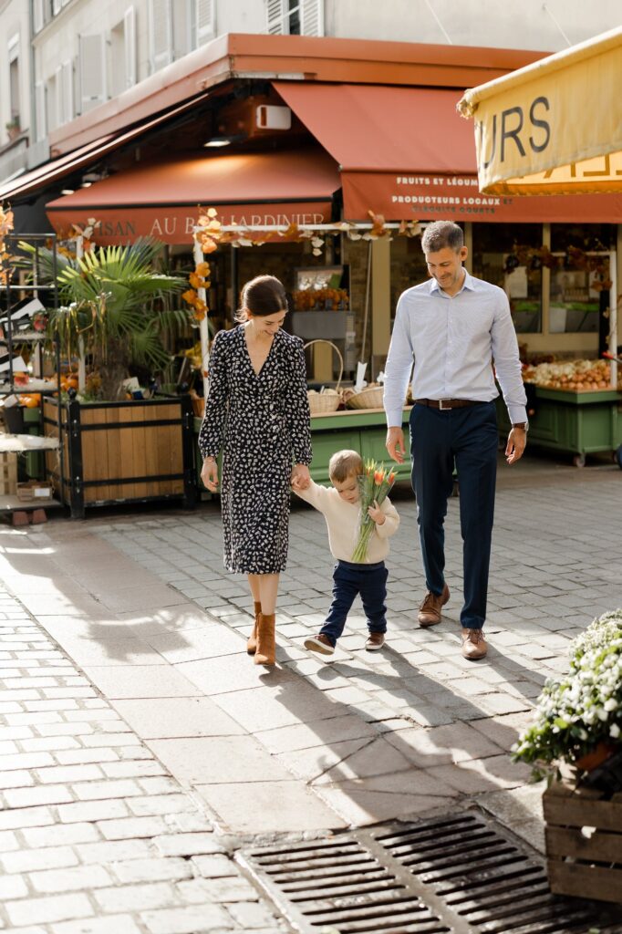Portrait of family shopping at Paris outdoor market by Katie Donnelly Photography