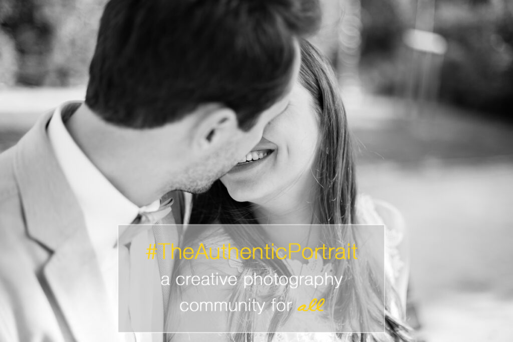 Black and white photo of a couple kissing, with the text The Authentic Portrait, a creative photography community