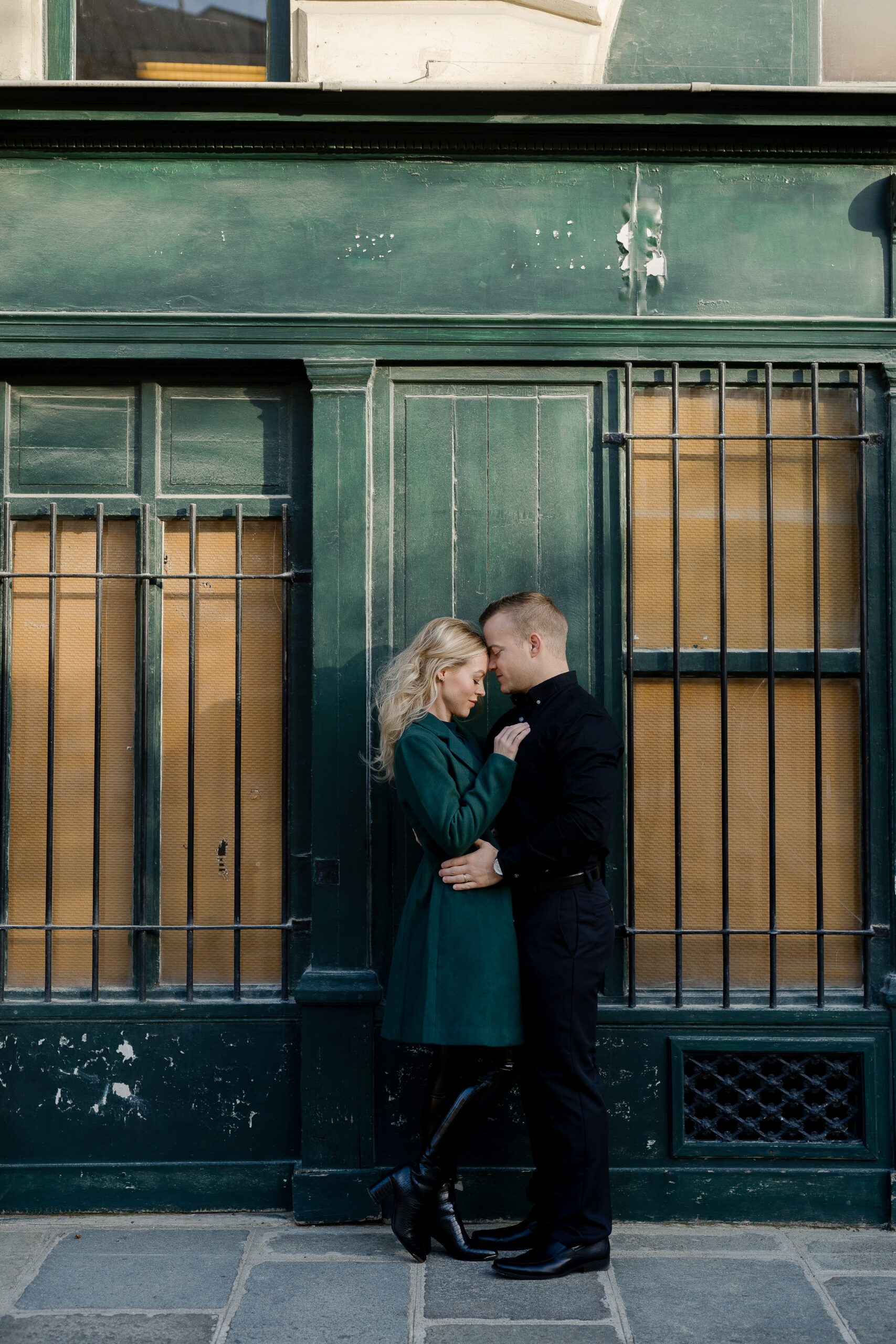 "Romantic couples portrait on Pont Neuf in Paris by photographer Katie Donnelly"