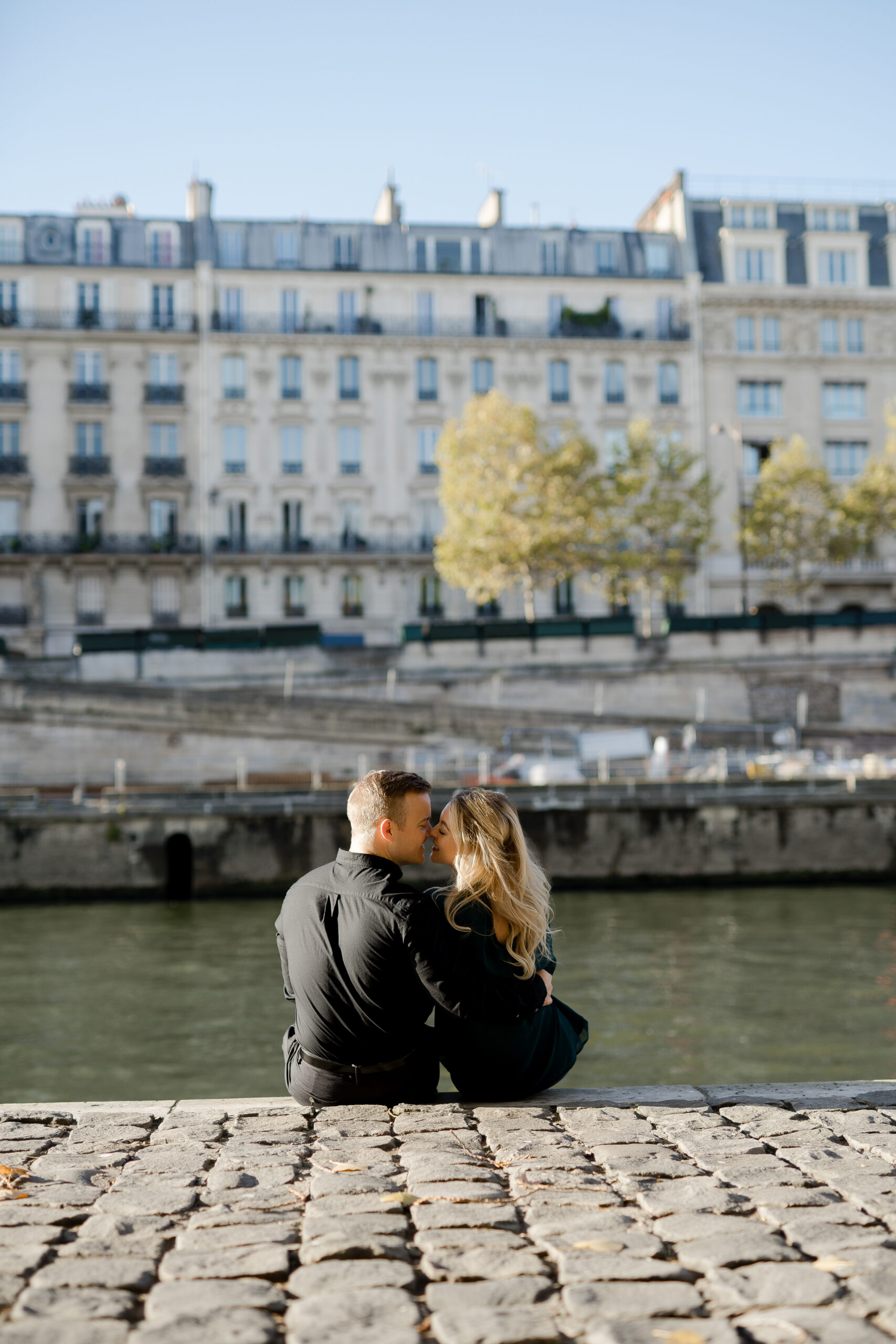 "Romantic couples portrait on Pont Neuf in Paris by photographer Katie Donnelly"