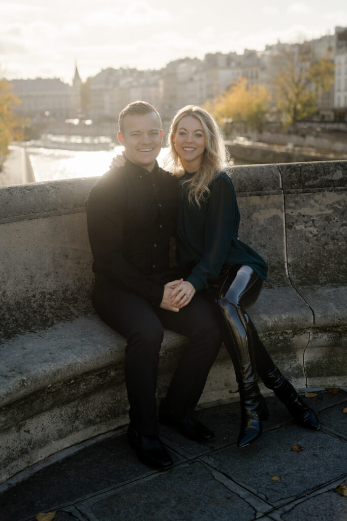 Romantic couples portrait on Pont Neuf in Paris by photographer Katie Donnelly