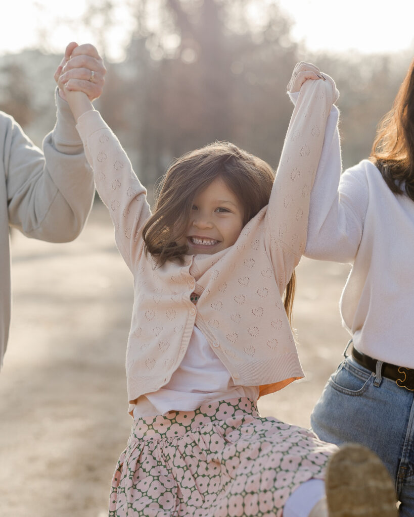 Portrait of a little girl dressed French at a park in Paris by Katie Donnelly Photography