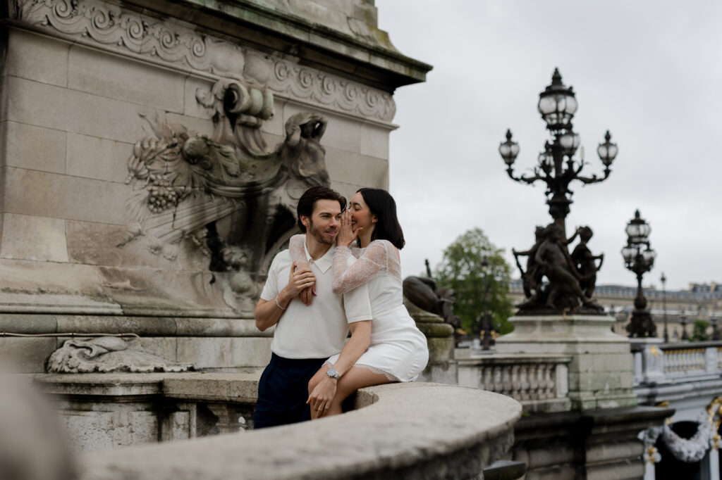 Paris photo shoot of young couple on pont alexandre III in Paris by Katie Donnelly Photography