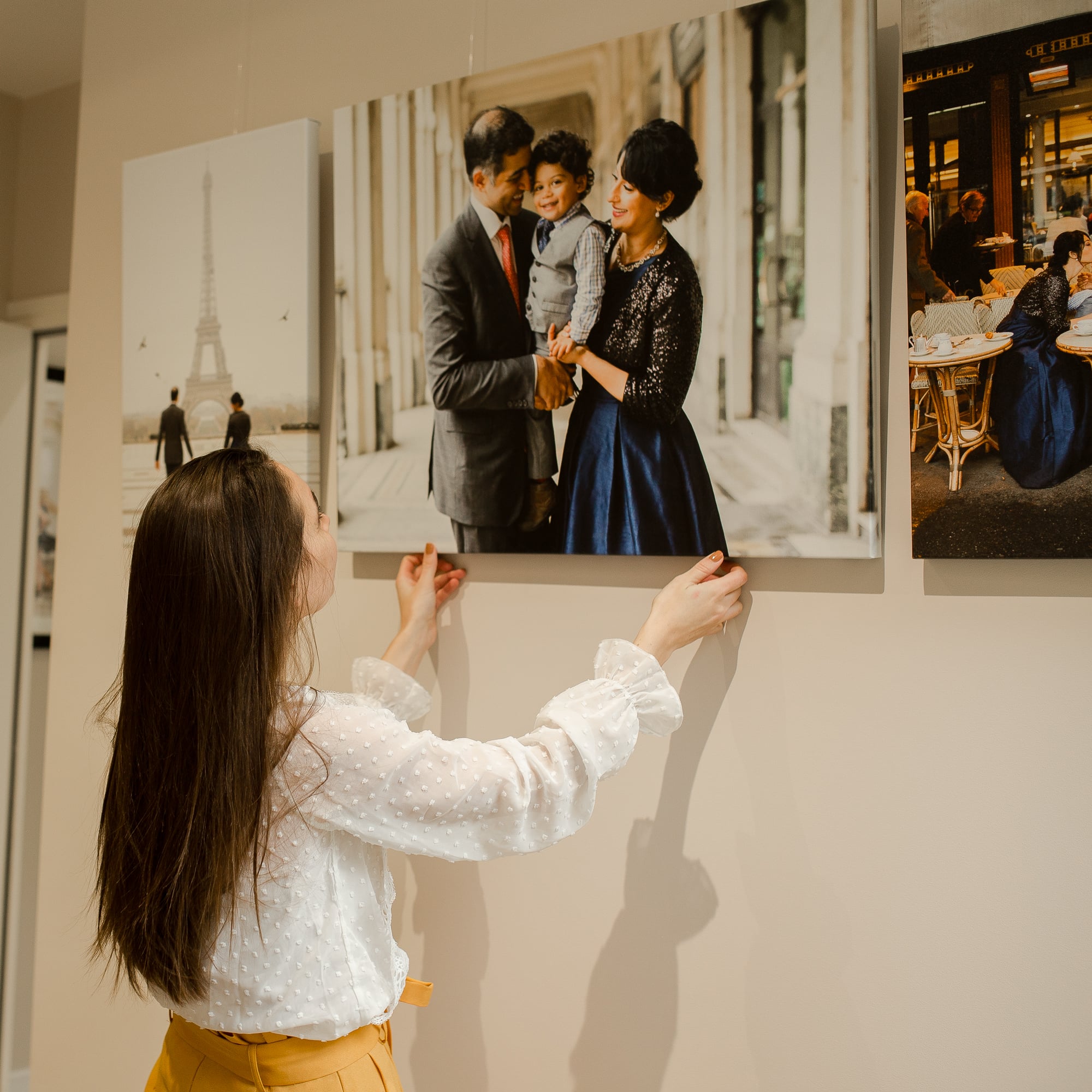 Paris Family Photographer, Katie Donnelly, with trip of art pieces in central Paris studio