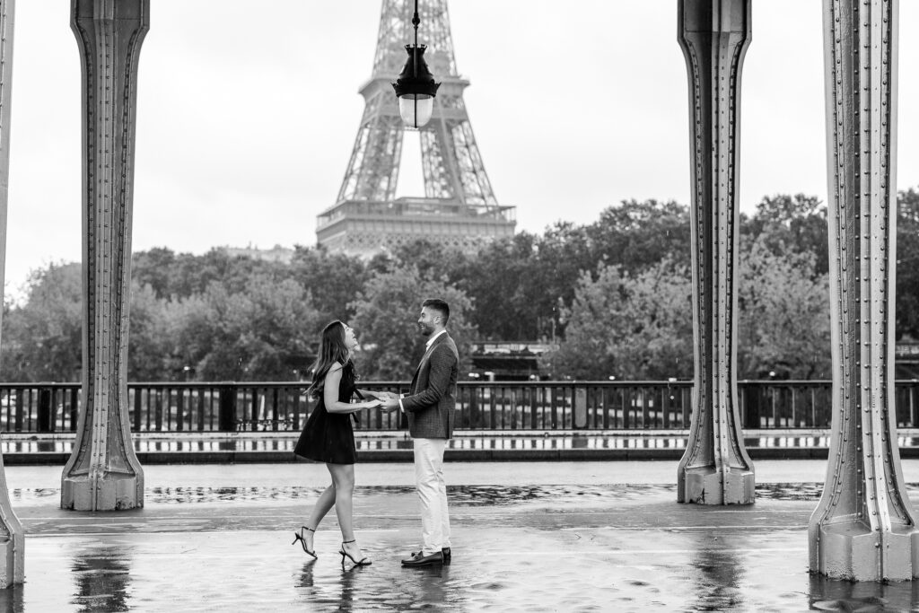 Black and white romantic portrait of couple on Bir Hakeim bridge in Paris by Katie Donnelly Photography