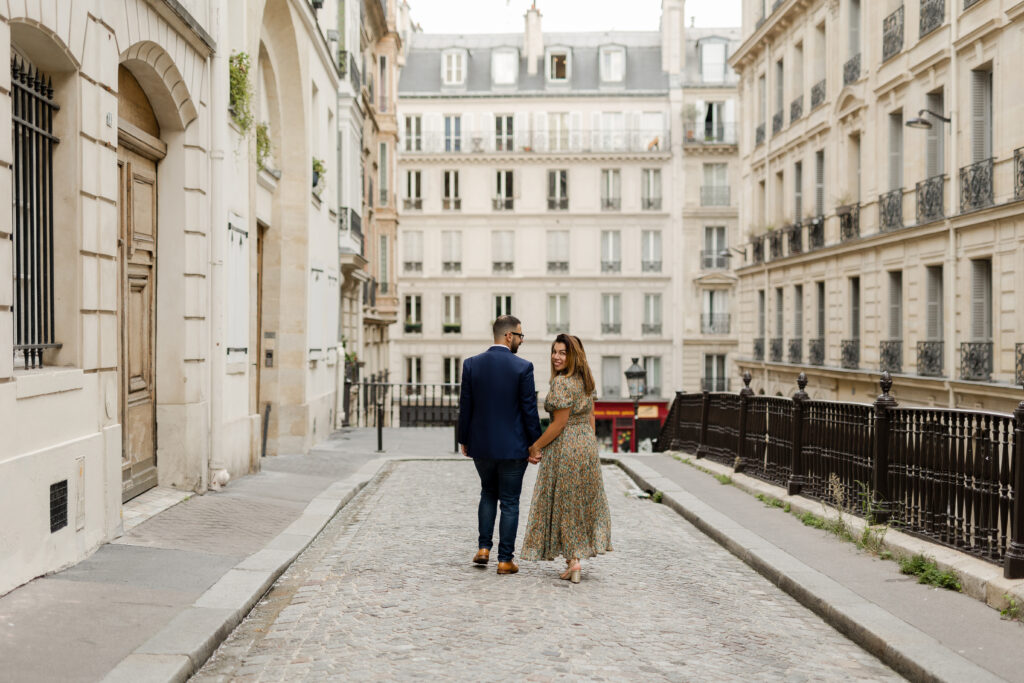 Couple walking together in Paris, captured by a Paris photographer