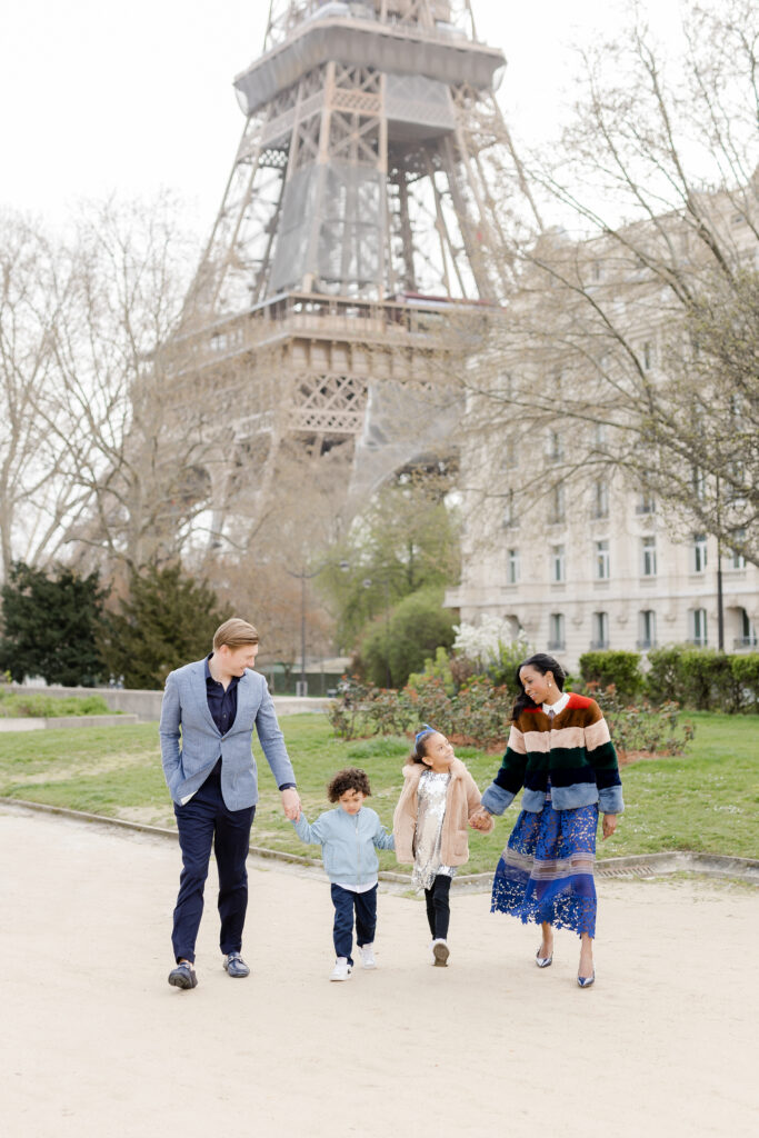 Paris family photoshoot: Walking together near the Eiffel Tower
