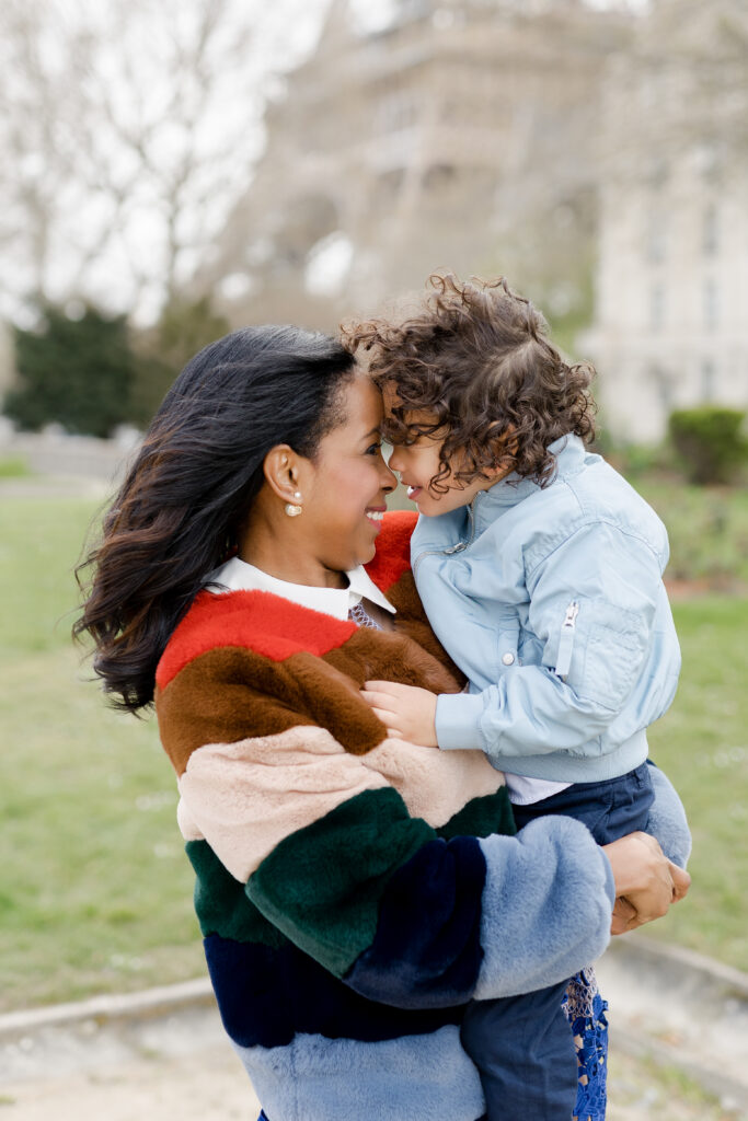 Parisian family photography: Mother and little girl holding hands