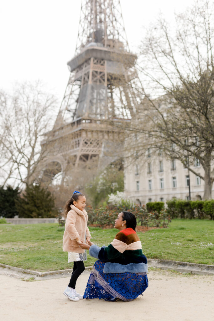 Parisian family photography: Mother and little girl holding hands