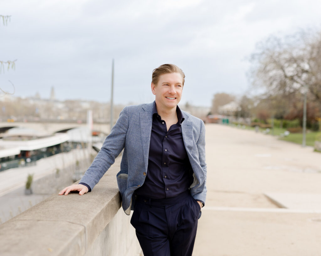 Classic Paris photography, man on Bir Hakeim Bridge, city views
