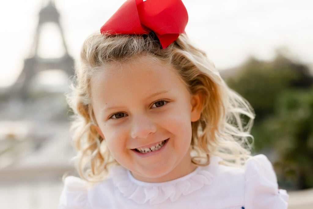 Smiling child in Paris, Spring 2025 portrait