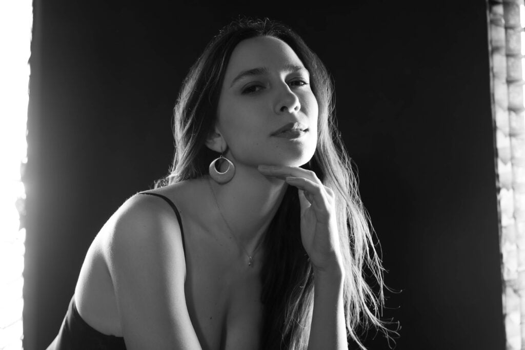 Black and white portrait of woman in Paris boudoir Photography session by Katie Donnelly Photography