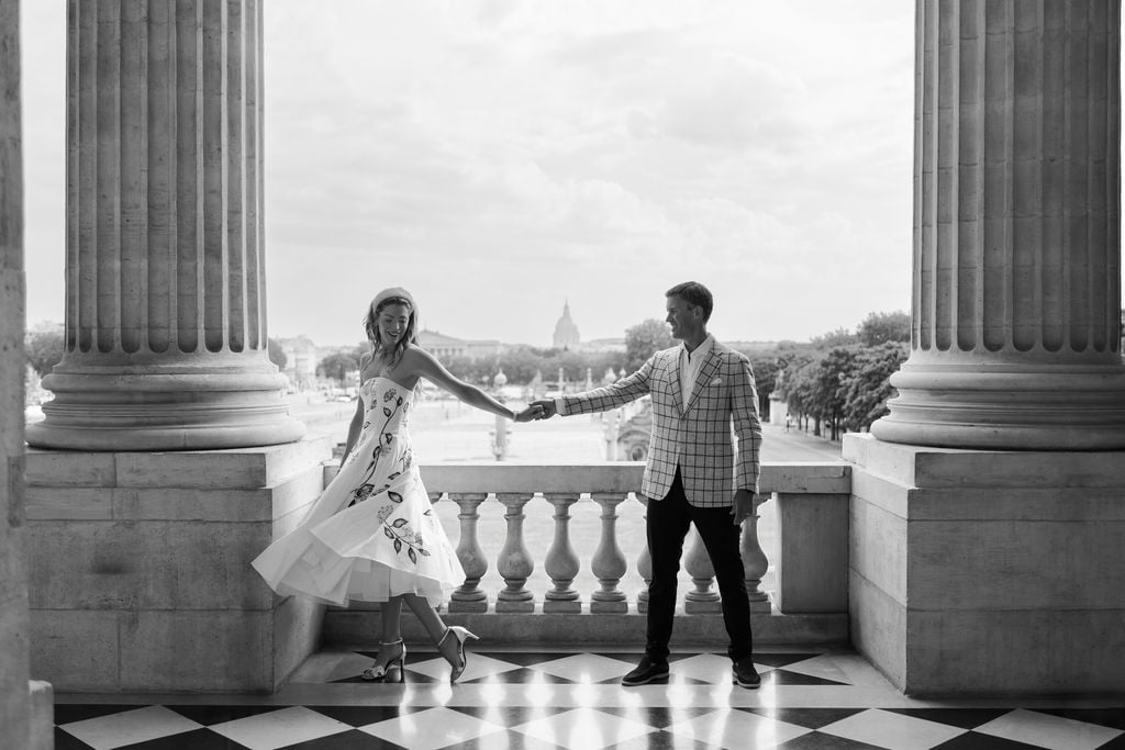 Black and white portrait of couple dancing on terrace at the Hôtel de Crillon in Paris by Katie Donnelly Photography
