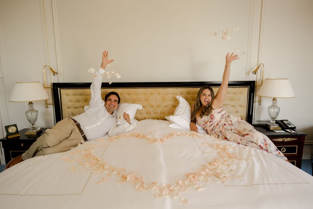 Portrait of couple on bed at the Shangri-La Hotel in Paris by Katie Donnelly Photography