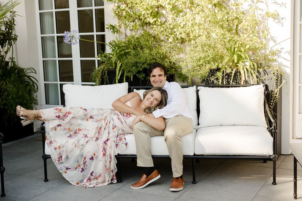 Portrait of couple laying on outdoor sofa at the Shangri-La Hotel in Paris by Katie Donnelly Photography