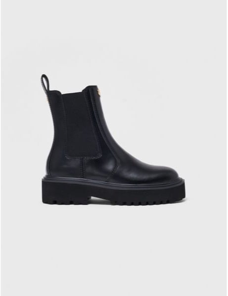 Maje black leather Chelsea boots for walking Paris in winter